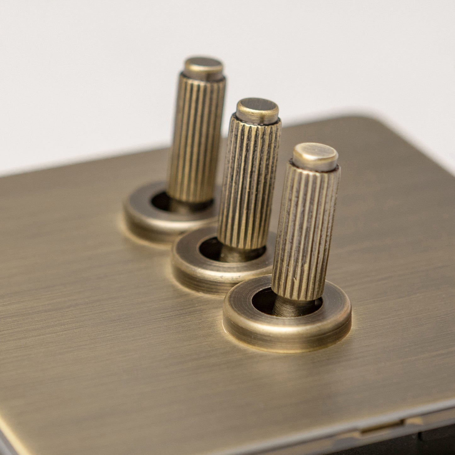 Antique Brass Switches and Sockets - Straight Knurled Design